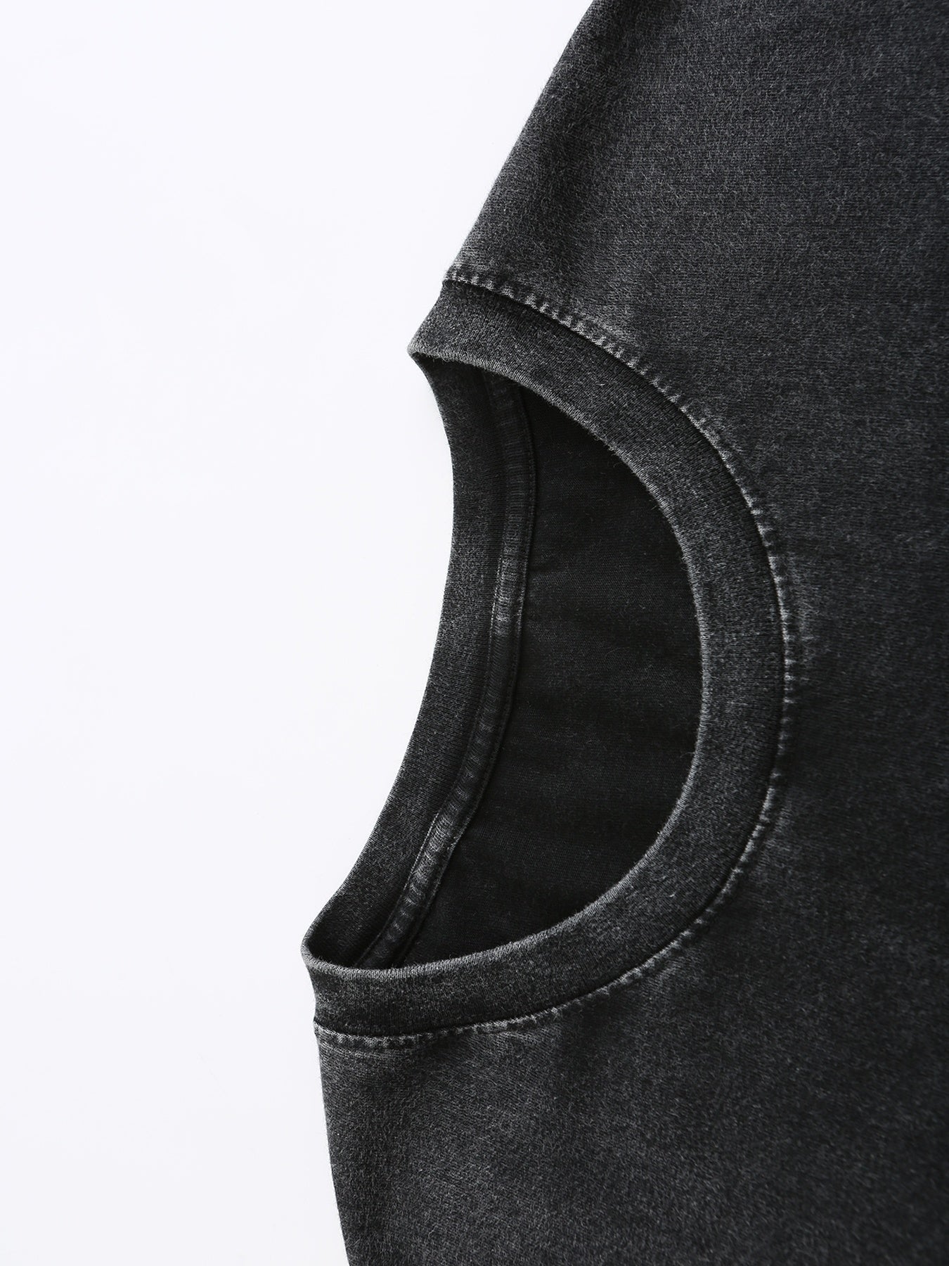 Close-up of soft, dark gray fabric with a slight stretch, perfect for casual wear and t-shirts.