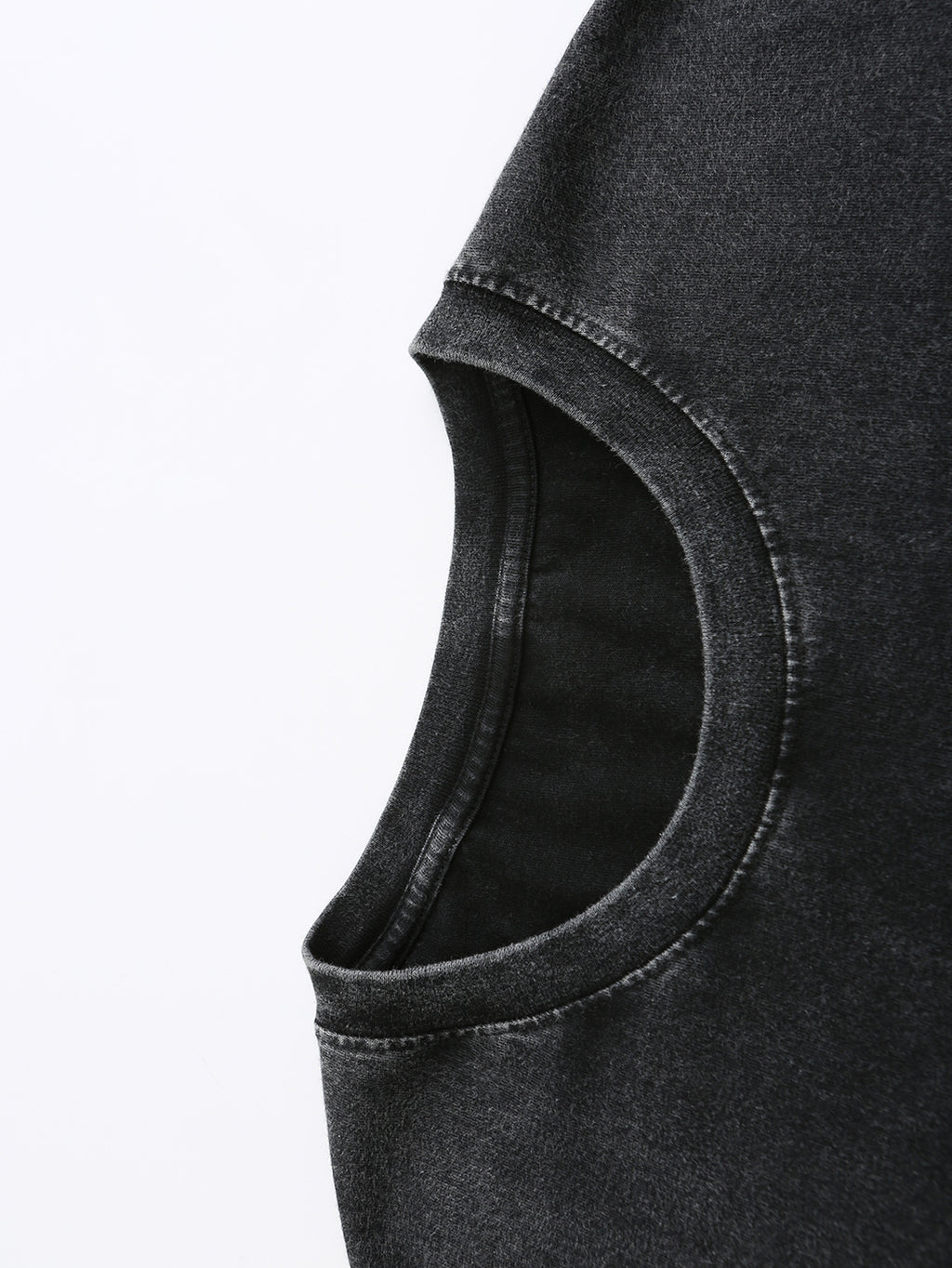 Close-up of soft, dark gray fabric with a slight stretch, perfect for casual wear and t-shirts.