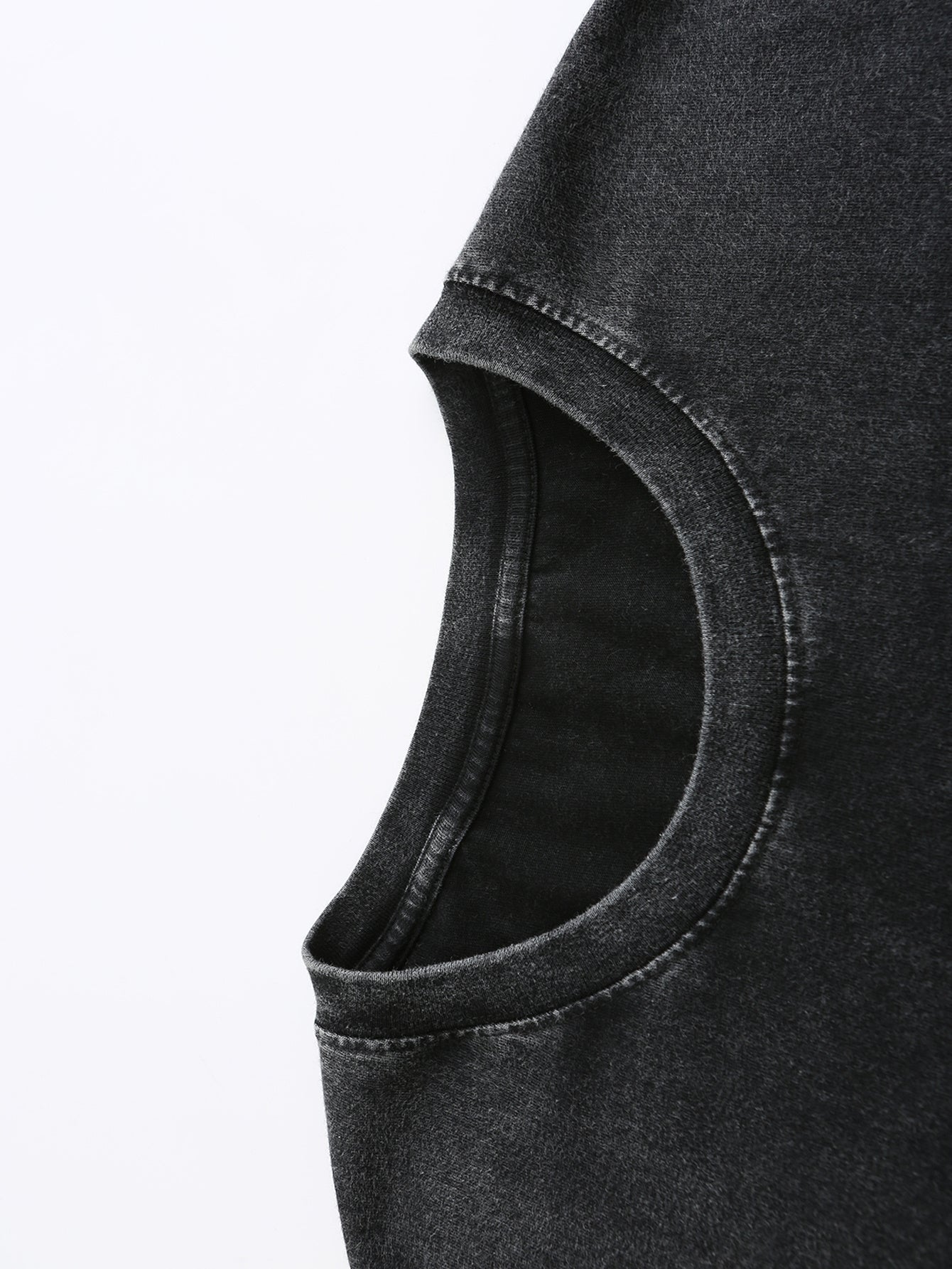 Close-up of soft, dark gray fabric with a slight stretch, perfect for casual wear and t-shirts.
