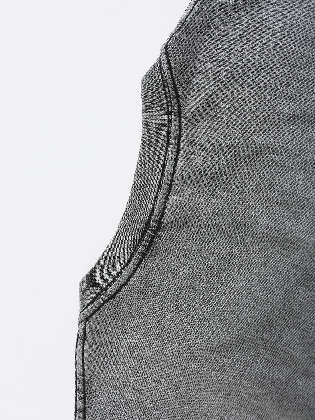 Close-up of soft, dark gray fabric with a slight stretch, perfect for casual wear and t-shirts.