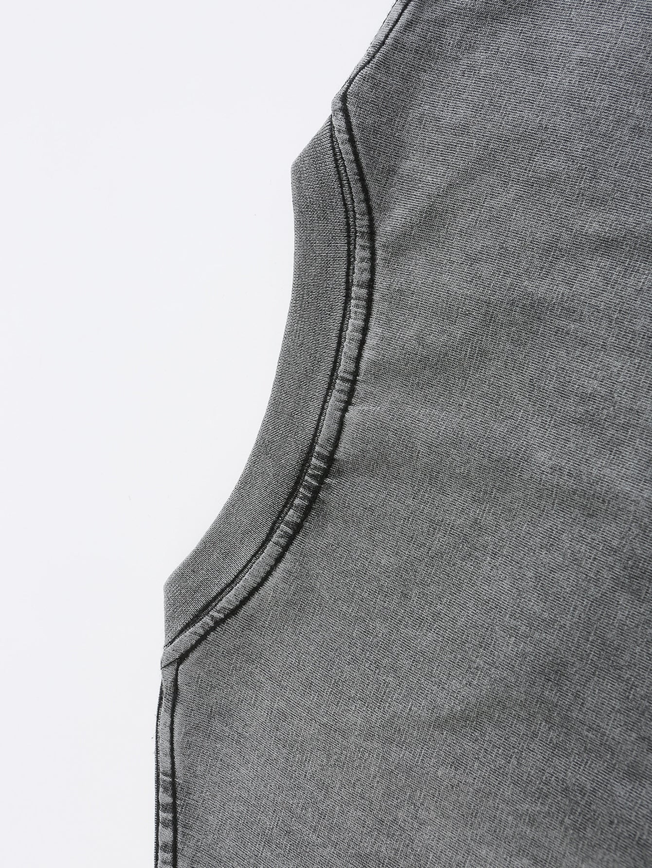 Close-up of soft, dark gray fabric with a slight stretch, perfect for casual wear and t-shirts.