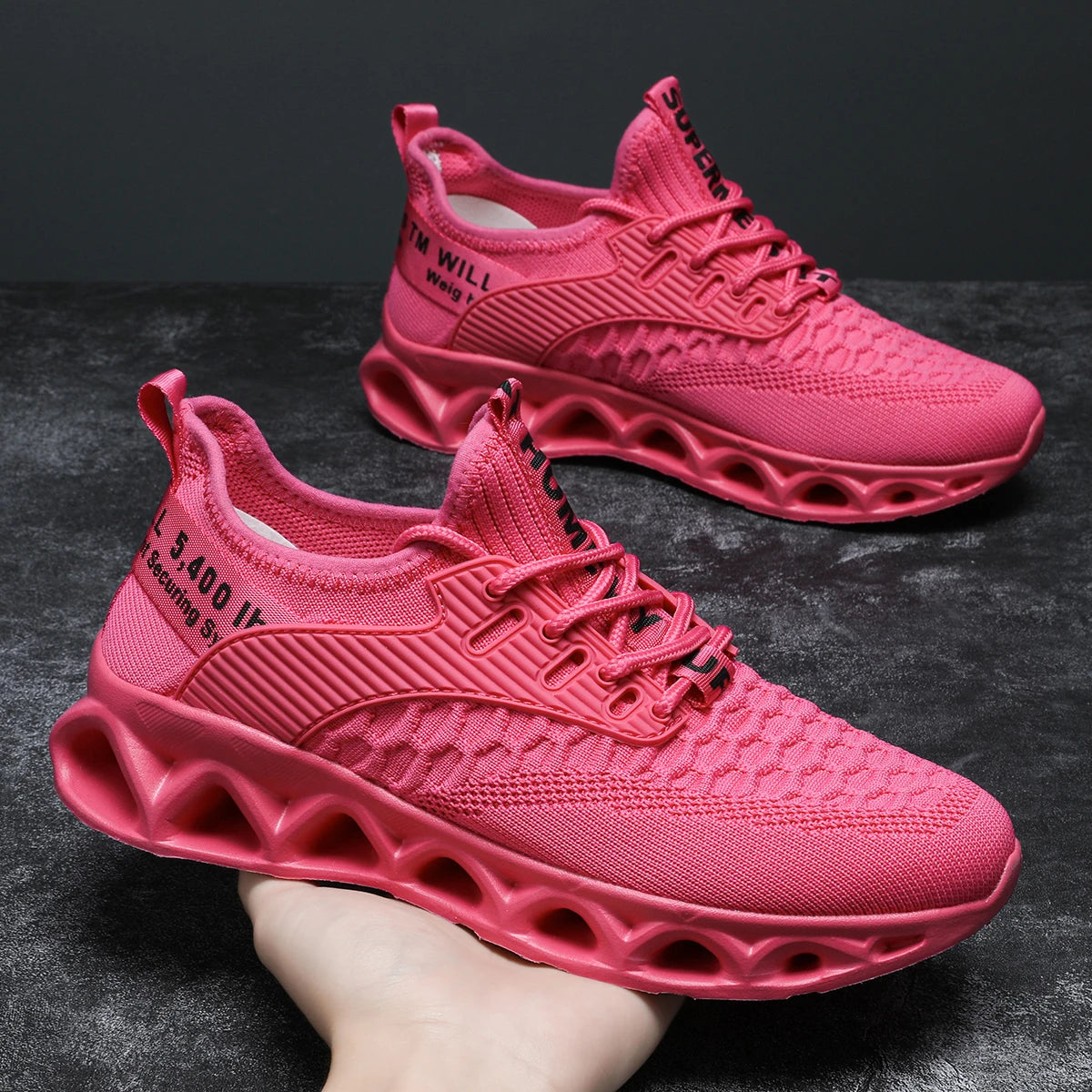 Bright pink orthopedic sneakers for women, featuring a lace-up closure and stylish design, perfect for comfort and style.