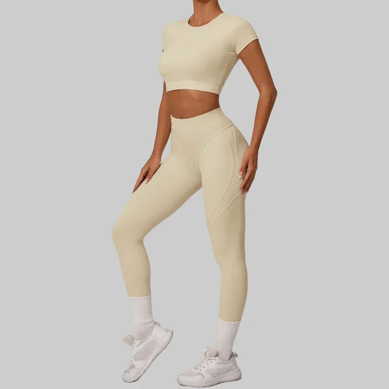 Women wearing seamless yoga sets in brown and beige, showcasing high waist and hip lift design, perfect for fitness activities.