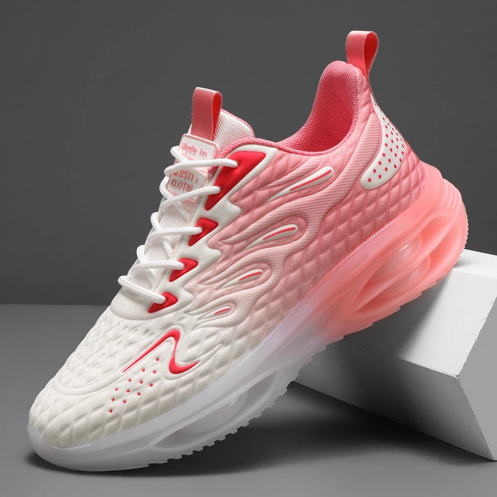 Stylish pink and white lace-up orthopedic sneakers for women with bubble sole and trendy design.