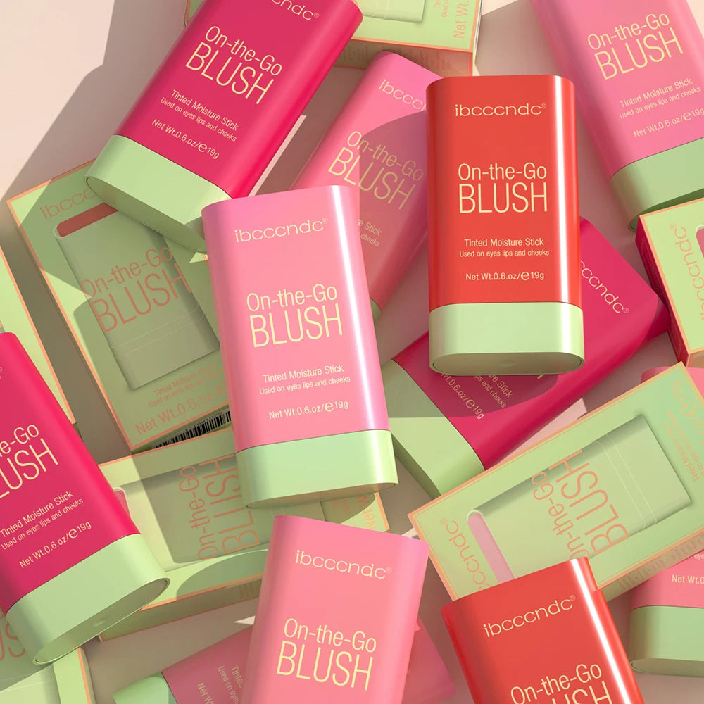 Colorful packaging of On-the-Go Blush by ibccandc, featuring tinted moisturizer sticks in various shades.