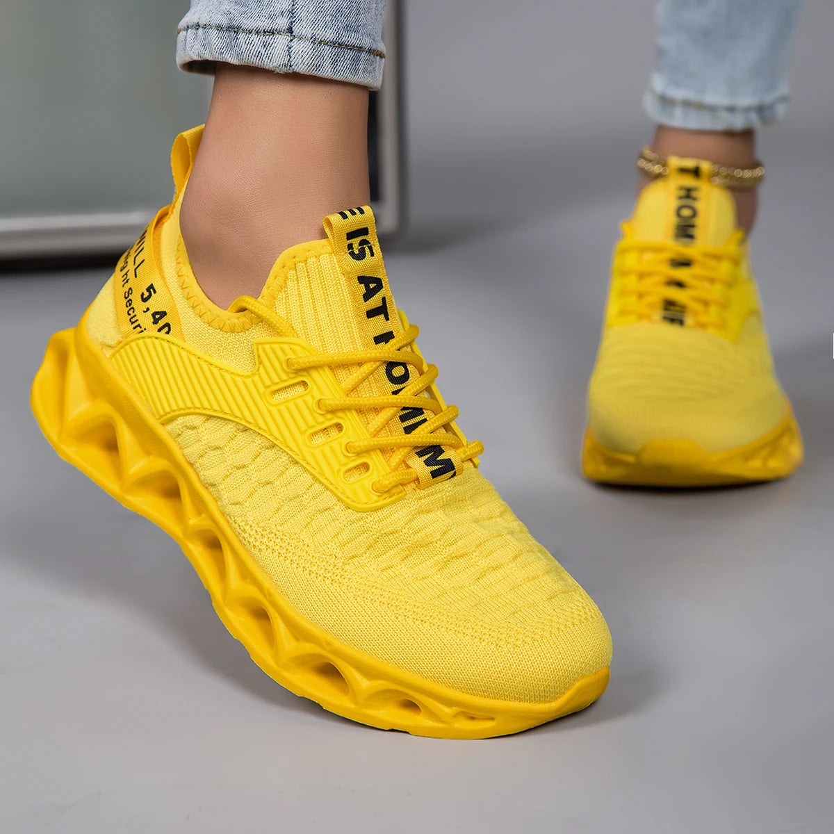 Bright pink orthopedic sneakers for women, featuring a lace-up closure and stylish design, perfect for comfort and style.