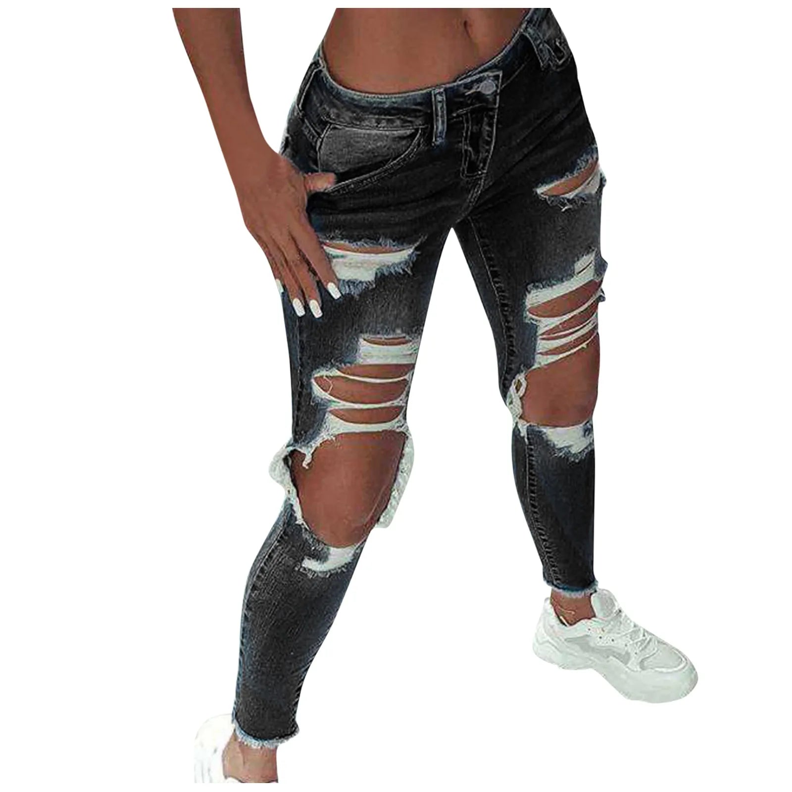 Mid waist women's distressed jeans with ripped detail, paired with stylish white sneakers for a trendy look.