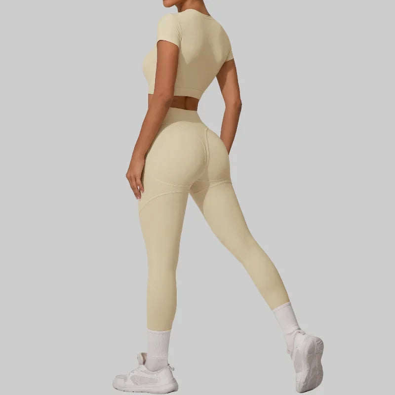 Women wearing seamless yoga sets in brown and beige, showcasing high waist and hip lift design, perfect for fitness activities.