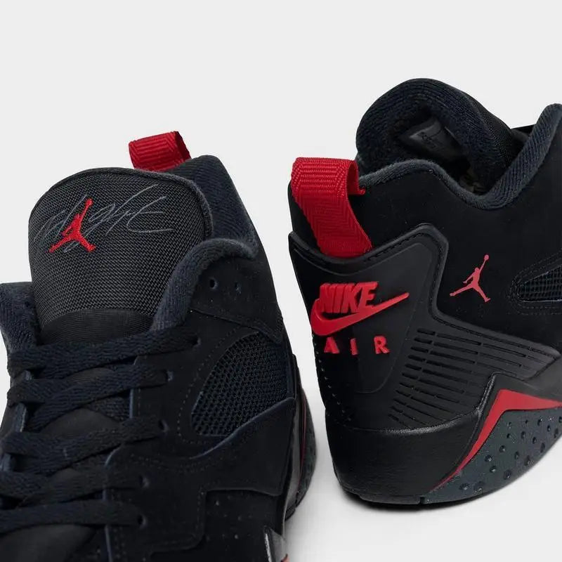 Big Kids' Air Jordan MVP 92 Basketball Shoes in black and red, showcasing a stylish design and breathable materials.