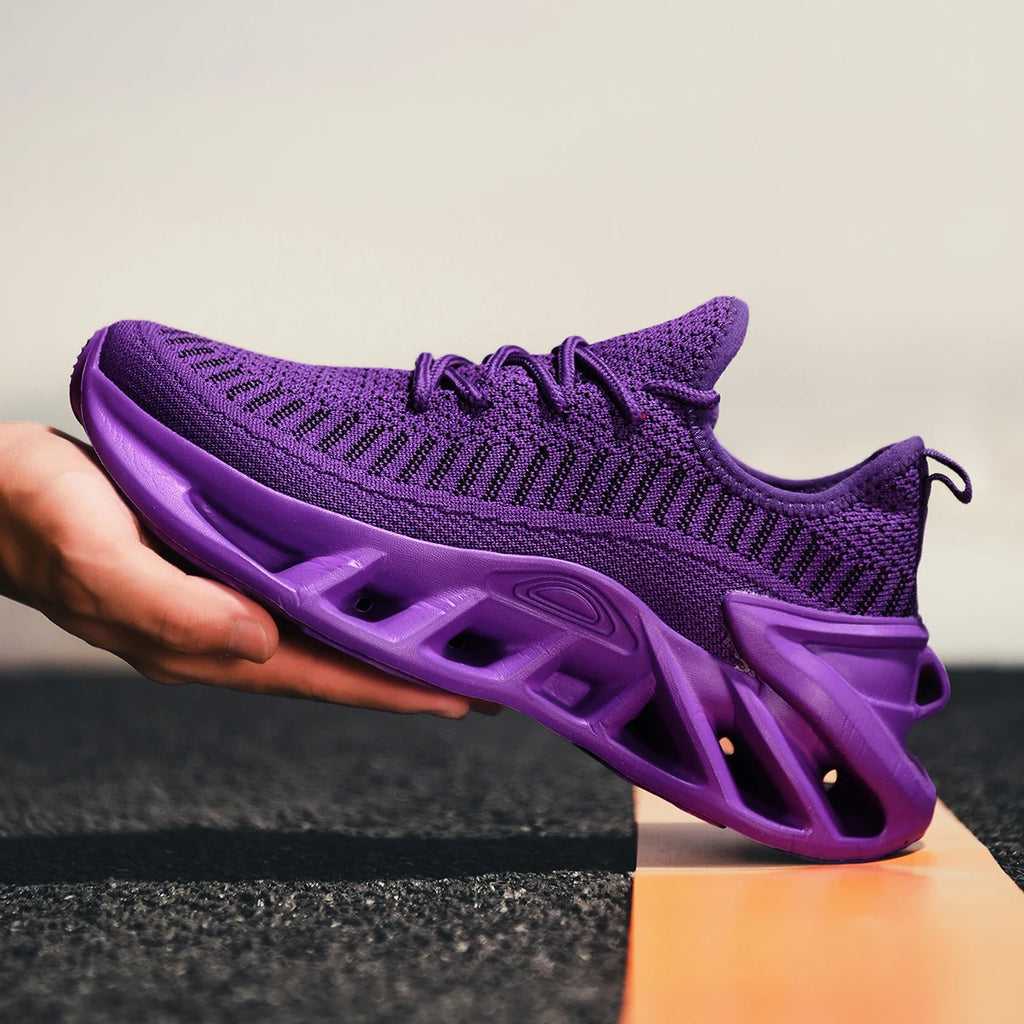 Purple lightweight mesh running shoes for women with lace-up closure and modern design.