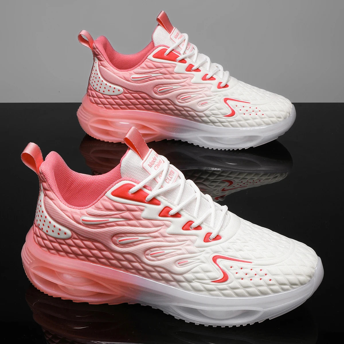 Stylish pink and white lace-up orthopedic sneakers for women with bubble sole and trendy design.