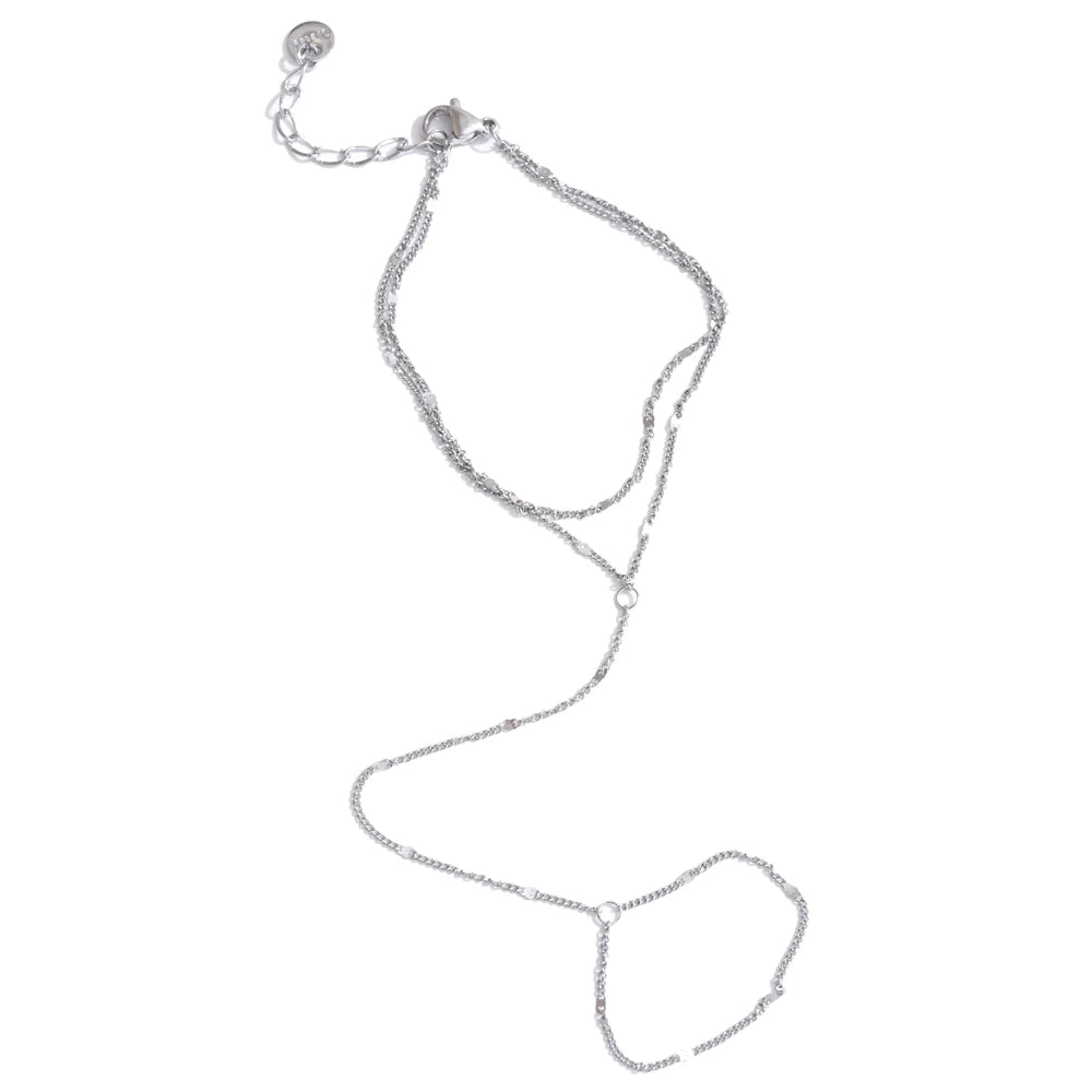 Trendy stainless steel link chain bracelets with zircon beads in gold and silver colors.