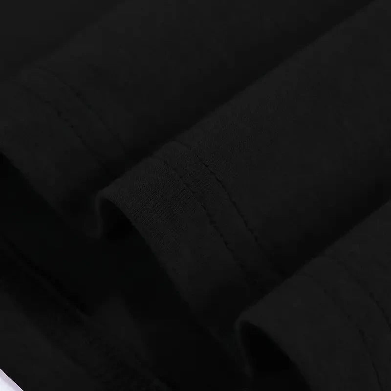 Black Zenitsu Demon Slayer tee featuring vibrant artwork and striking designs, perfect for anime fans.