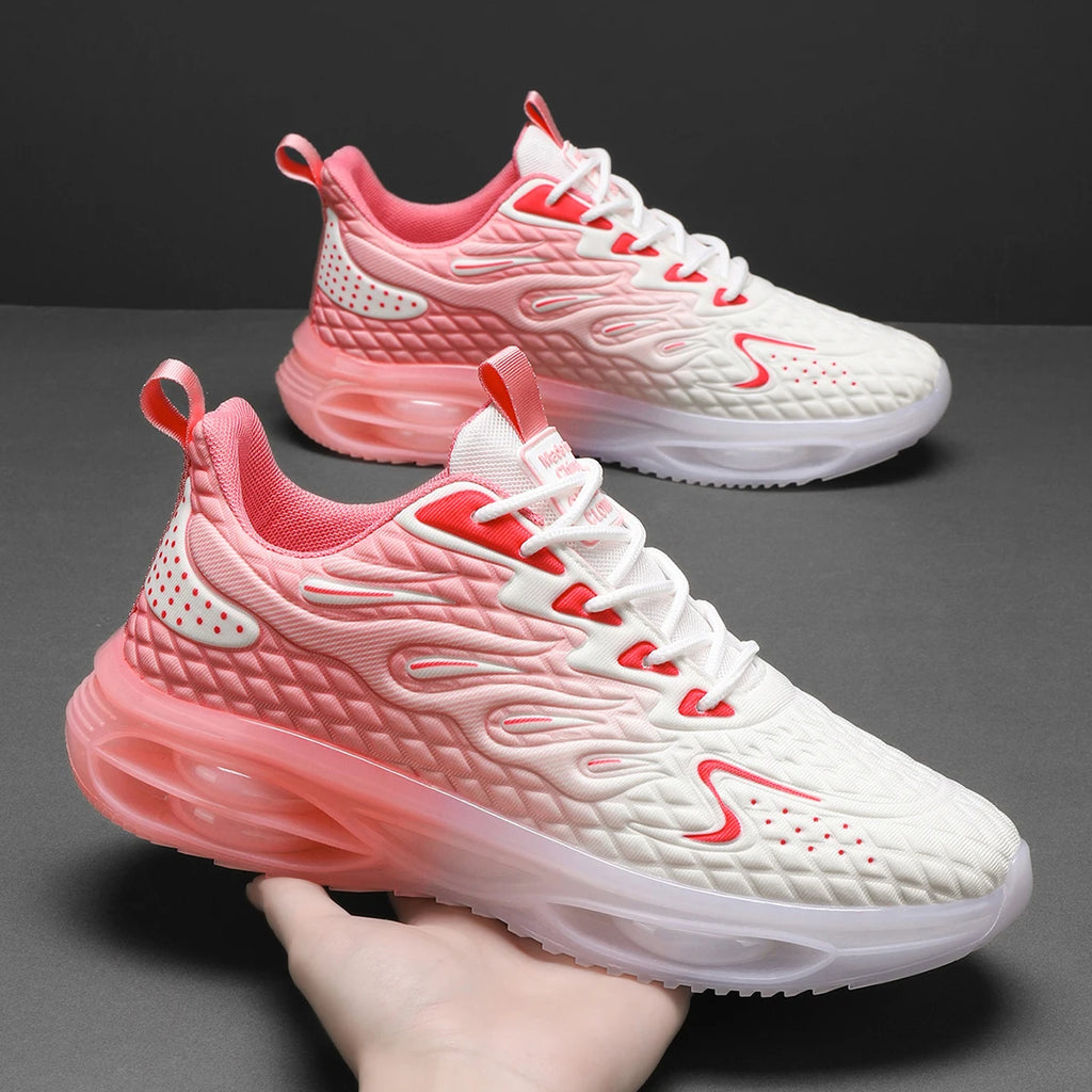 Stylish pink and white lace-up orthopedic sneakers for women with bubble sole and trendy design.