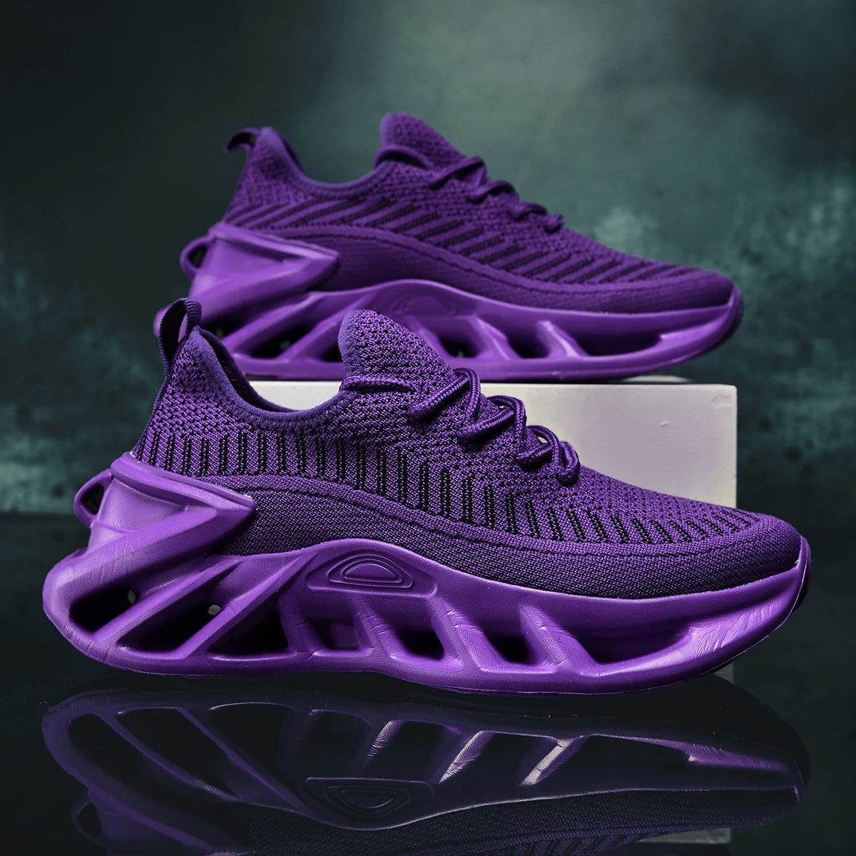 Purple lightweight mesh women's running shoes with lace-up closure and low heel design.