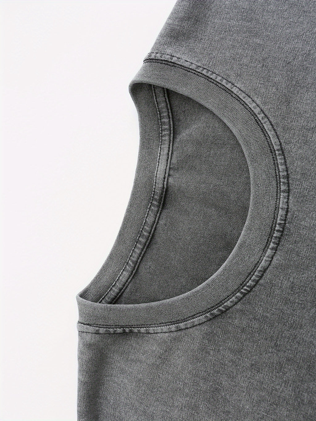 Close-up of soft, dark gray fabric with a slight stretch, perfect for casual wear and t-shirts.